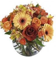 Bouquet of seasonal flowers in orange and yellow colours