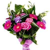 Romantic spirit - Composition: pink gerbera,ornamental foliage,packing,rose pink,eustoma purple,white carnation.