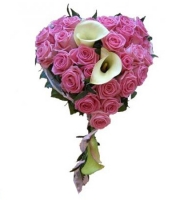 Heart of Venice - Composition: rose pink,white calla lilies,ornamental foliage,oasis-heart.