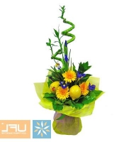 Citron - Composition: iris blue,ornamental foliage,packing,yellow gerbera,fruit,bamboo.