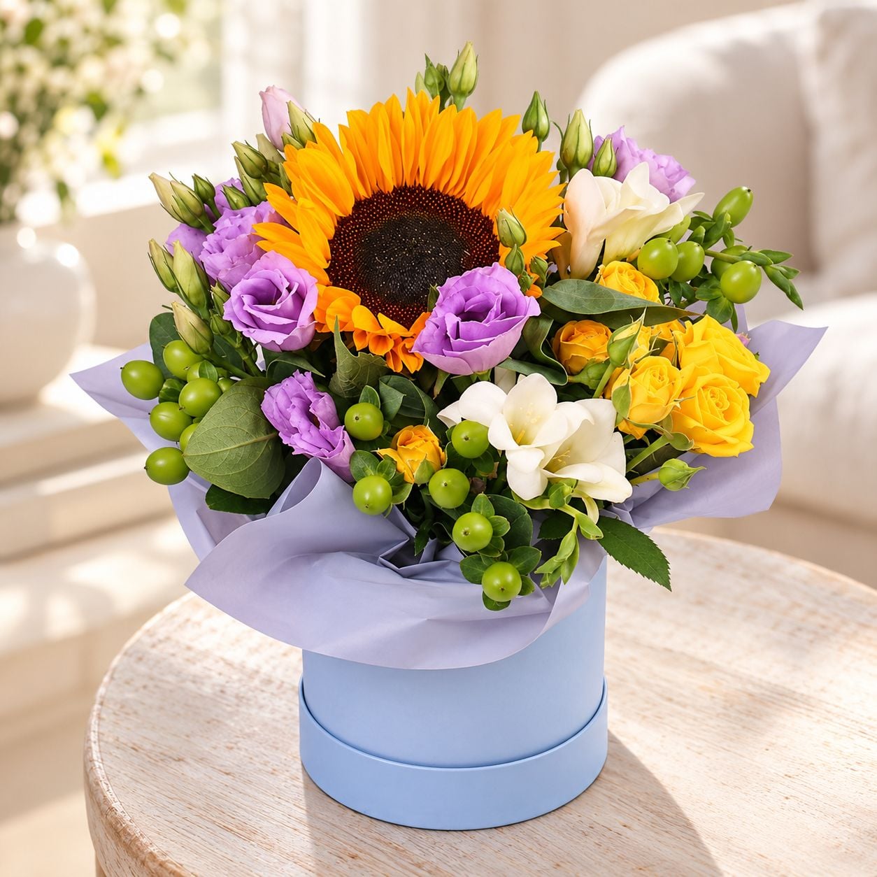 sunflower, eustoma (3 pcs.), freesia (2 pcs.), hypericum, oasis, spray rose, packaging, ribbon