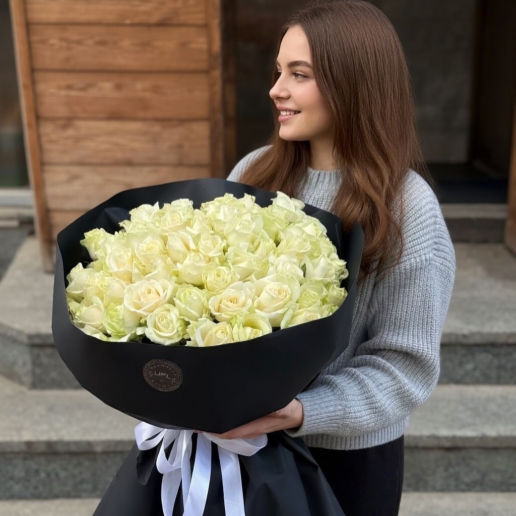 Bouquet 51 white roses in black wrapping
