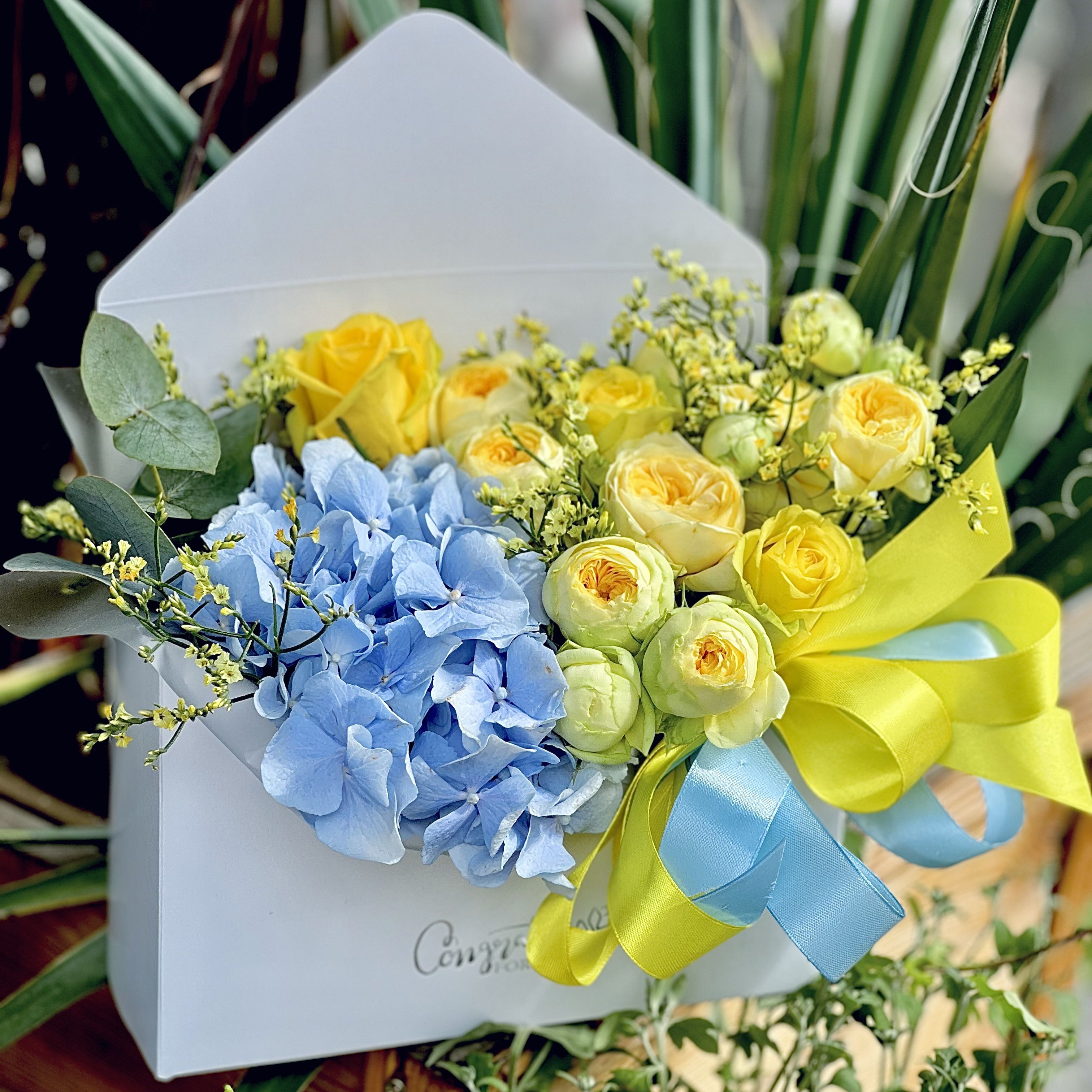 floral envelope, packaging, ribbon