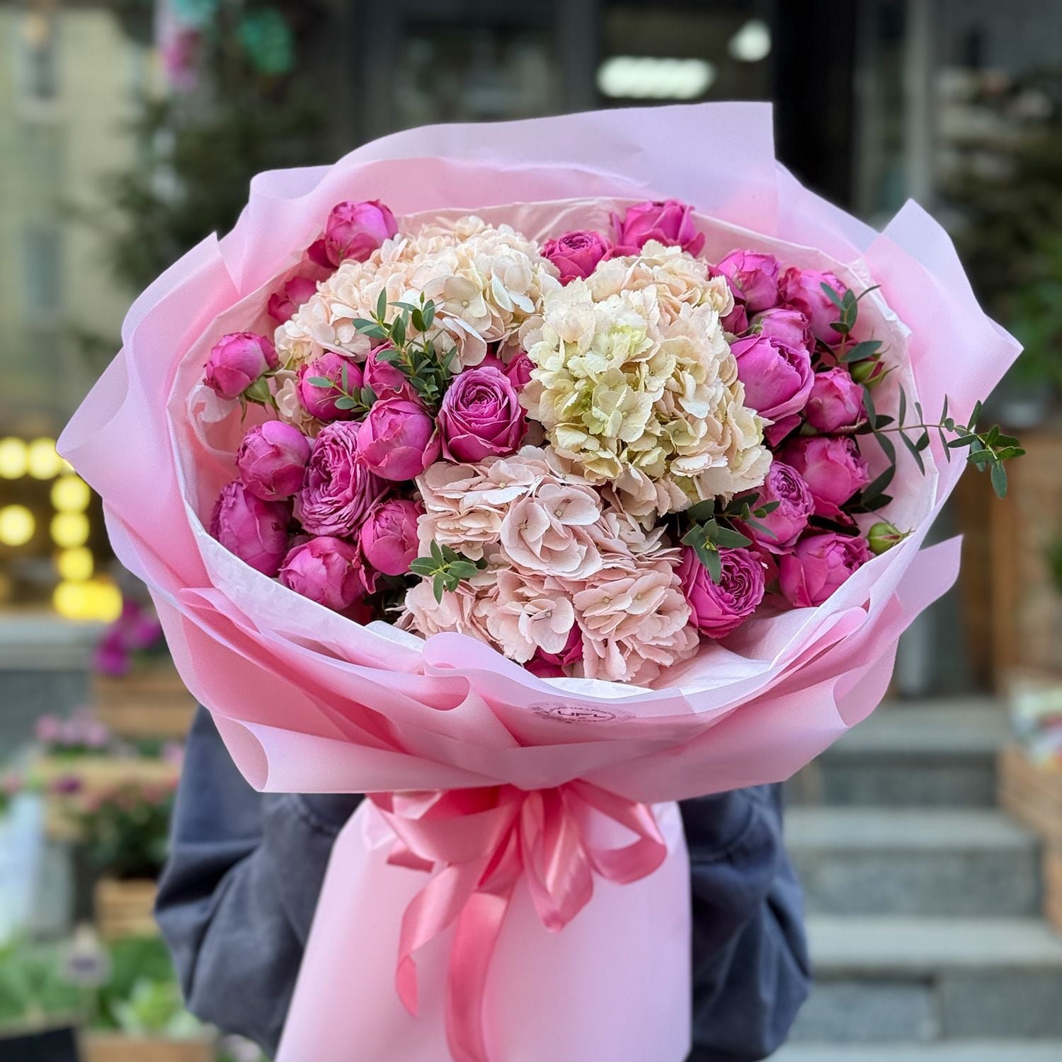 hydrangea, rose (9 pcs.), eucalyptus, packaging, ribbon
