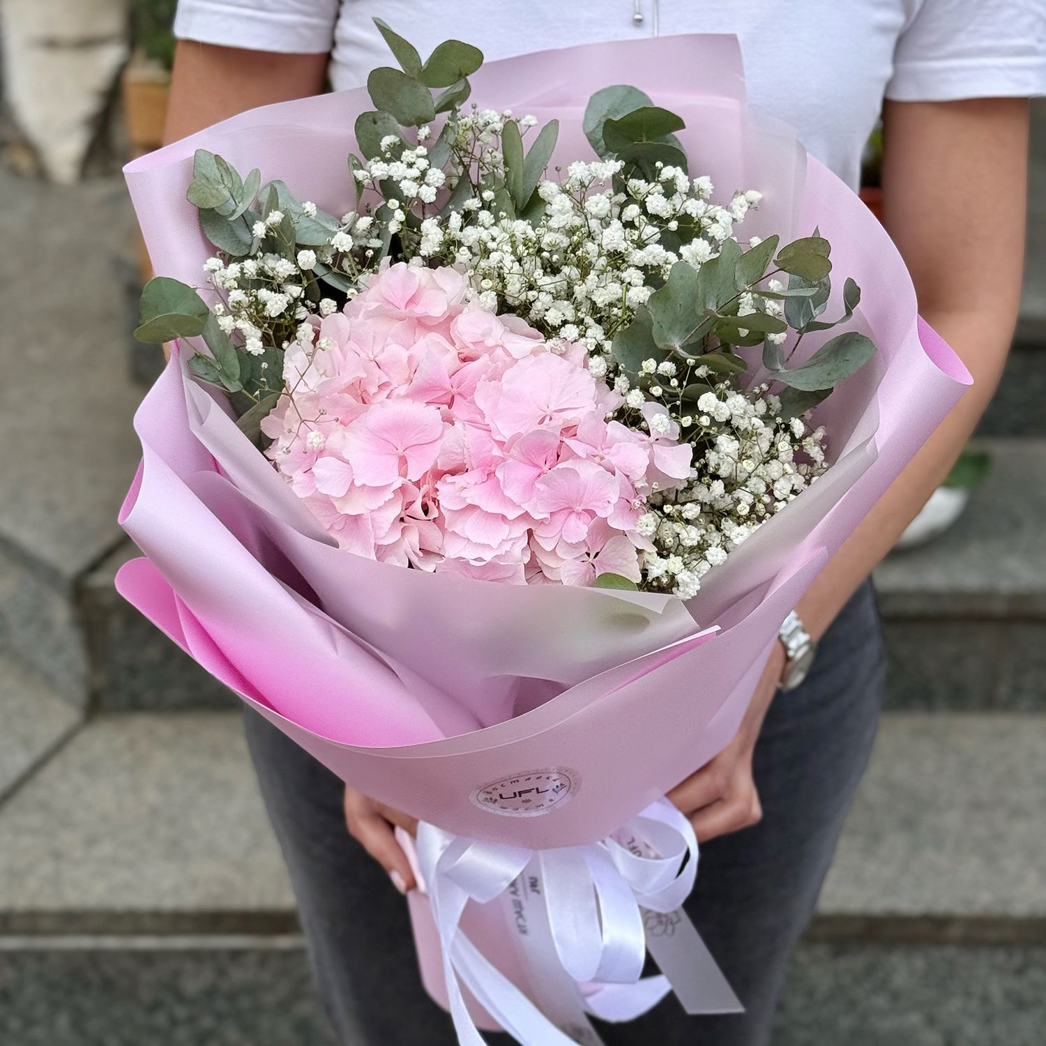 pink hydrangea, gypsophila (3 pcs.), eucalyptus, packaging, ribbon